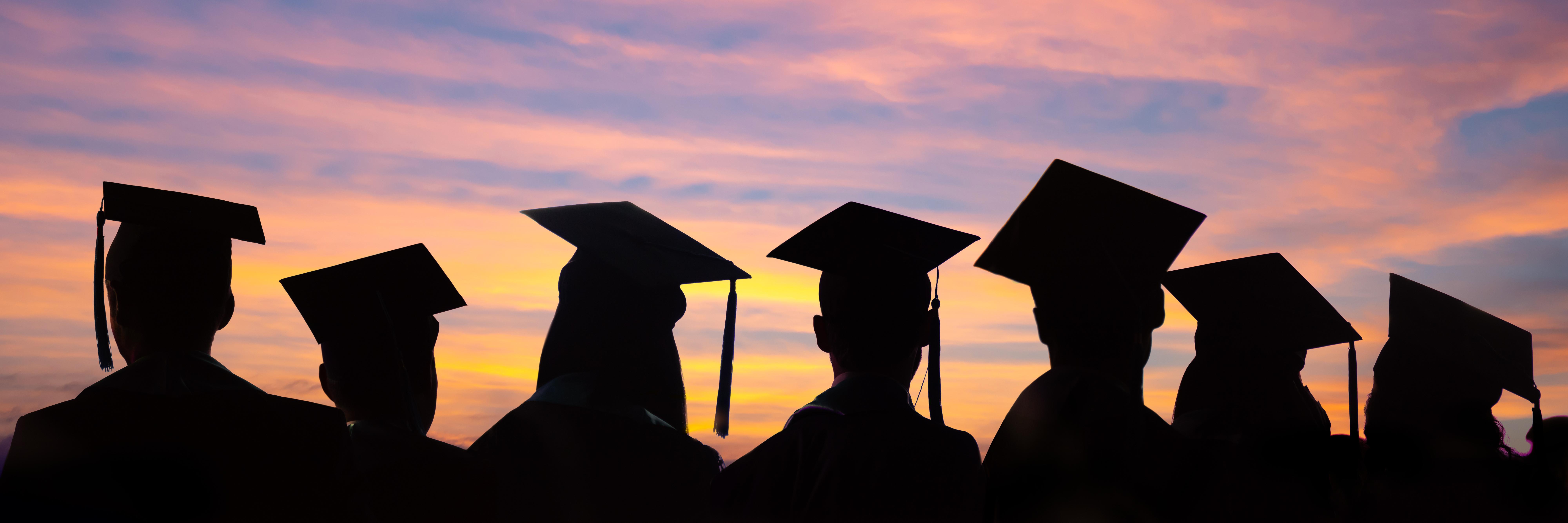 Grads in sunset